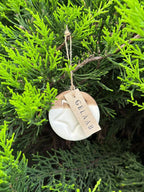 Handmade Ceramic Circle Ornament with Star Carving