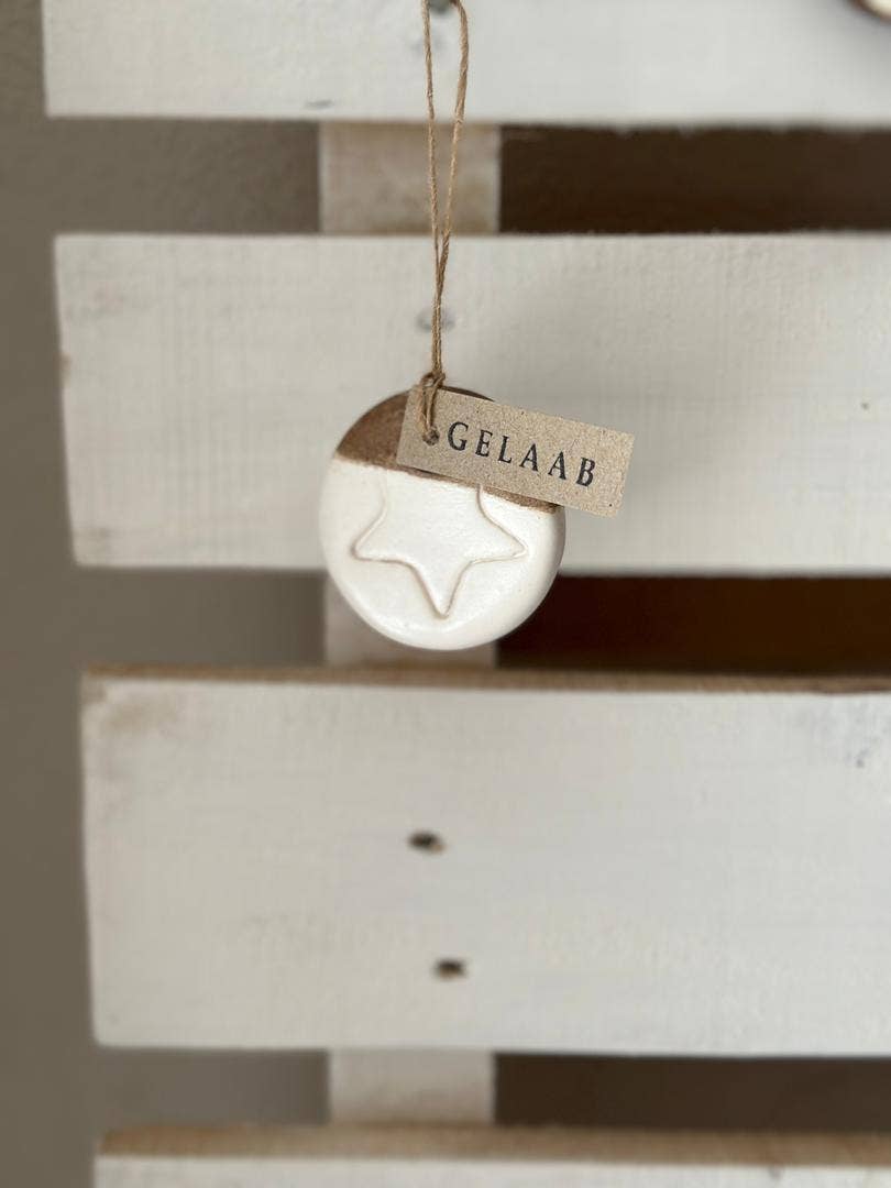 Handmade Ceramic Circle Ornament with Star Carving