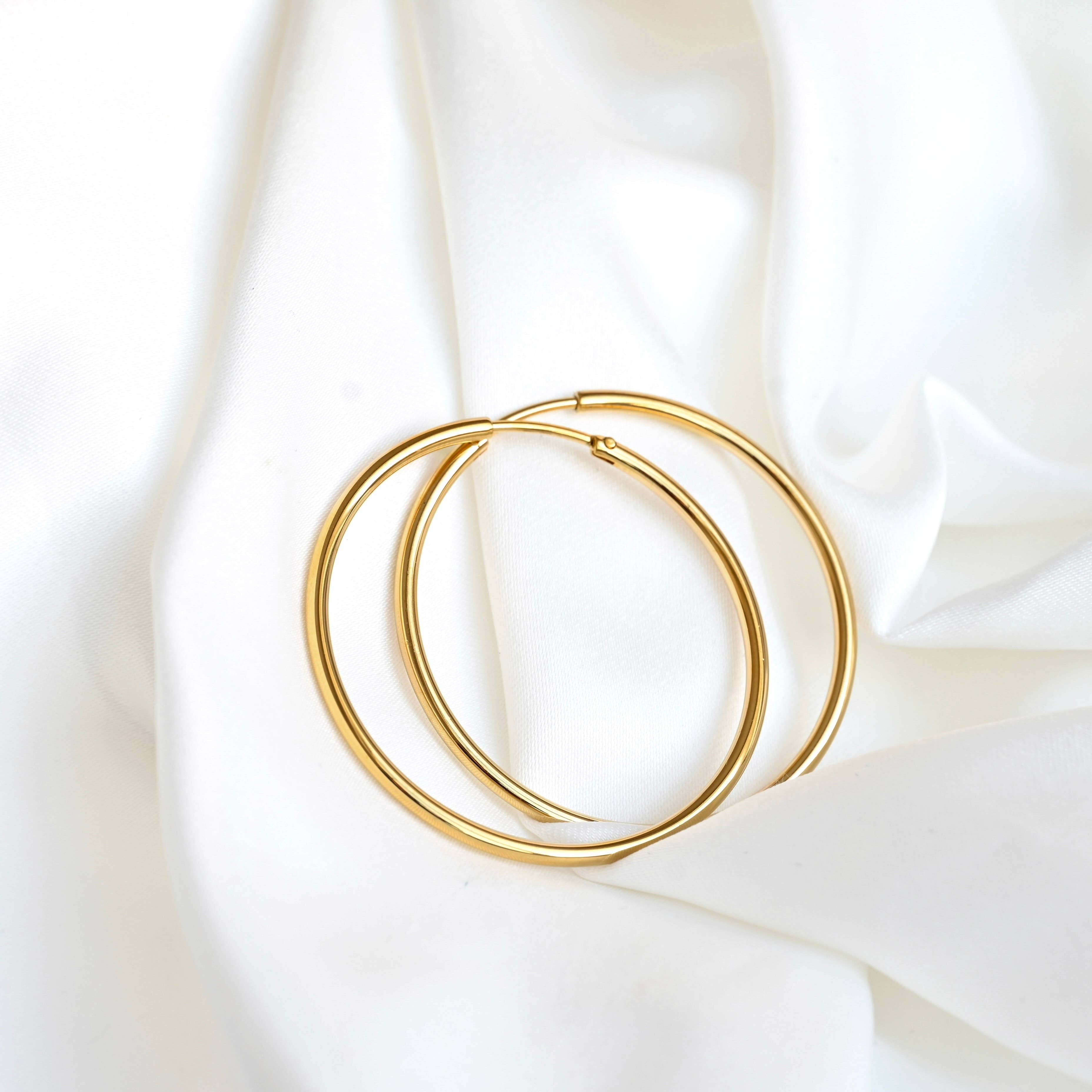 Blueyejewelry - Endless Hoop Earrings