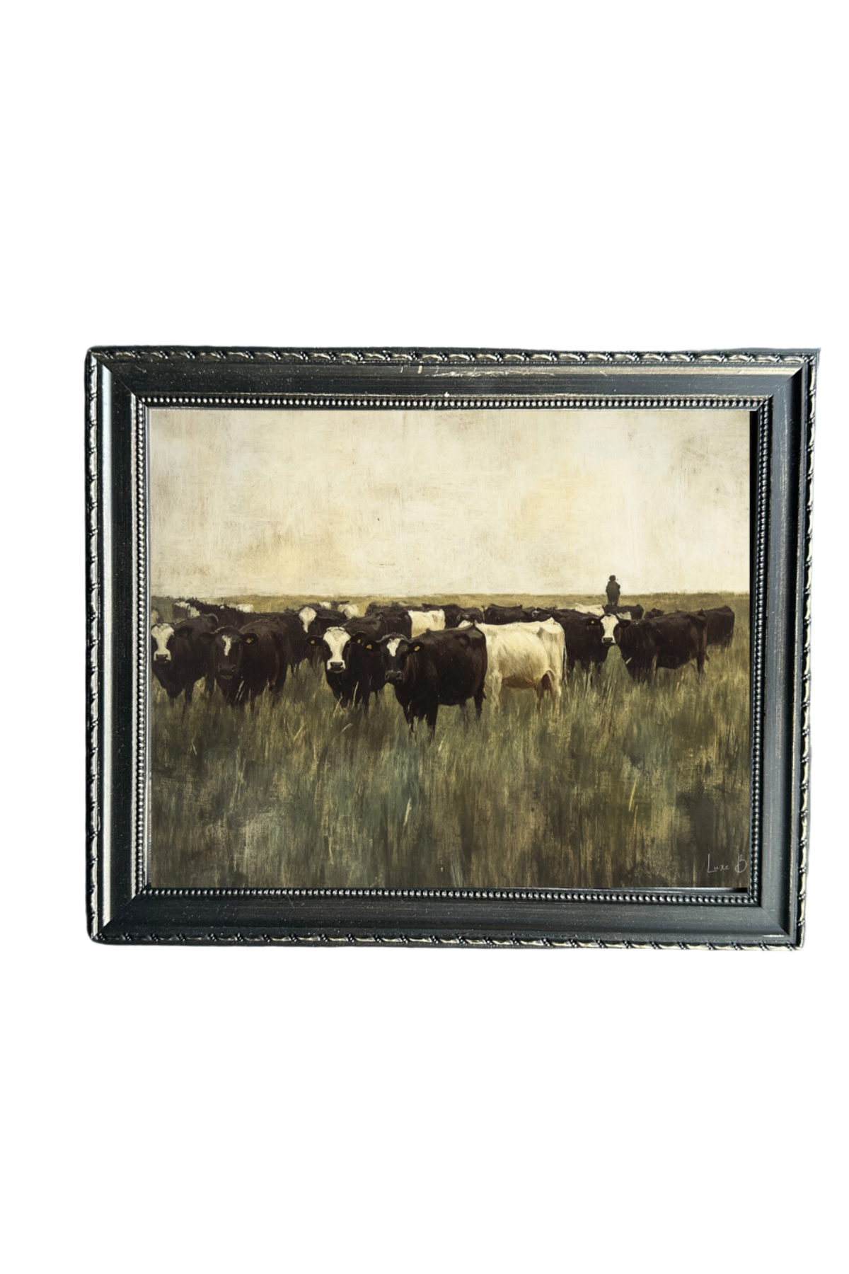 Grazing Cows artwork by Luxe B Co Canada showing black and white cattle in a grassy field within a dark decorative frame.