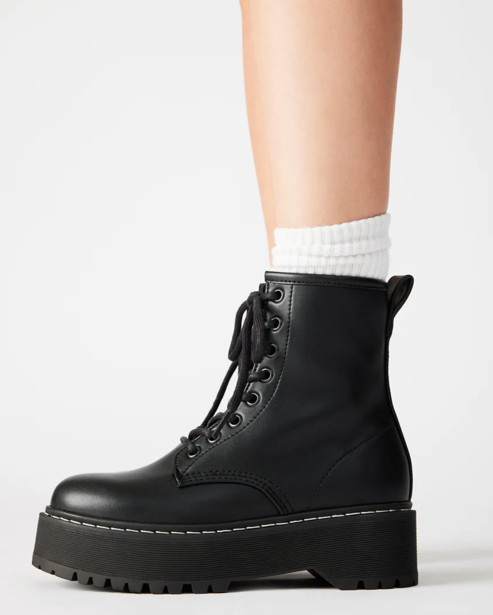 Model wearing Bettyy ankle boots