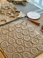 Handmade Ceramic Circle Ornament with Star Carving