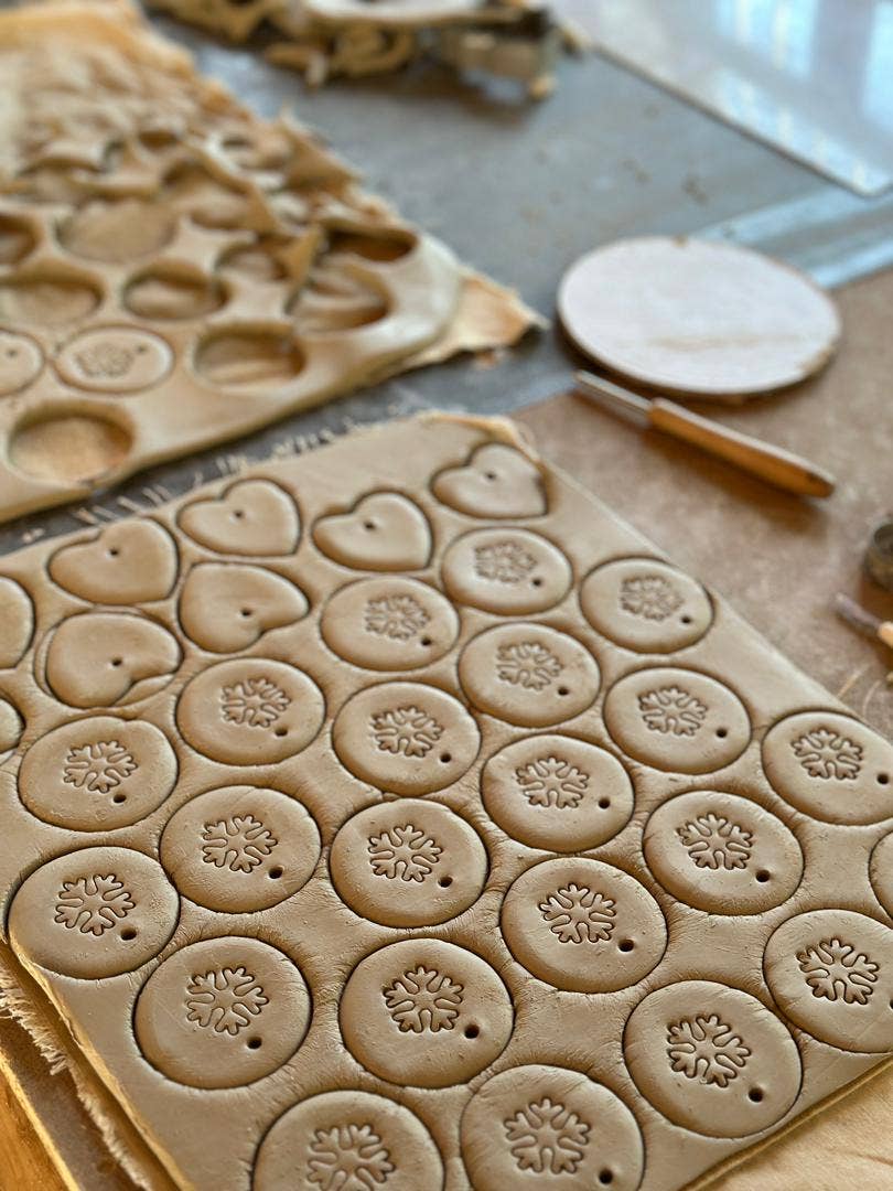 Handmade Ceramic Circle Ornament with Snowflake Carving