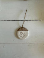 Handmade Ceramic Circle Ornament with Snowflake Carving