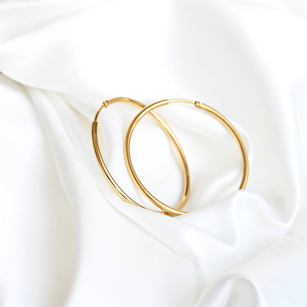 Blueyejewelry - Endless Hoop Earrings