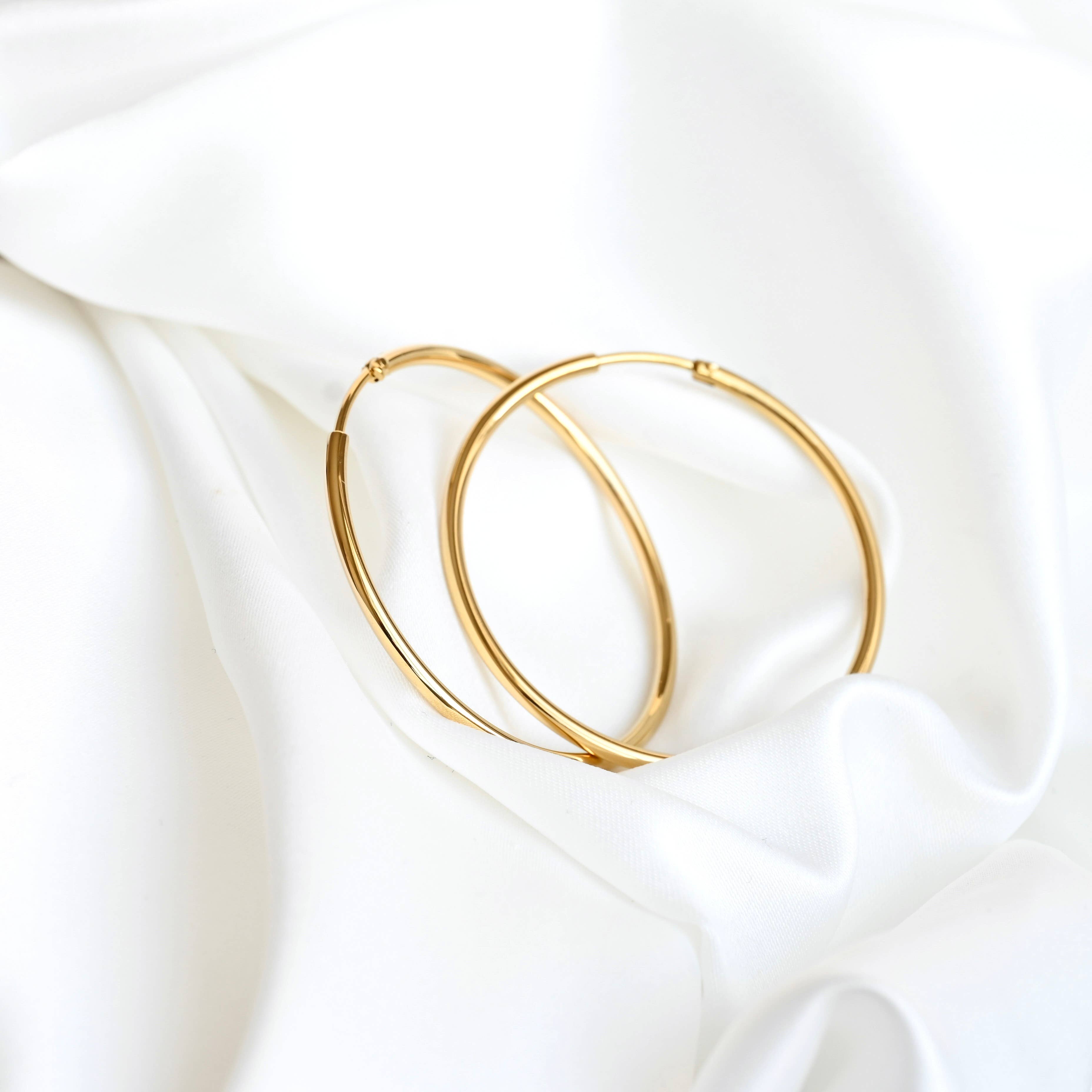 Blueyejewelry - Endless Hoop Earrings