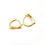 Rear and side views of gold-tone criss cross hoop earrings on a white surface, showing the hinged closures and polished backs.